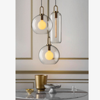 Glass Globe or Capsule Pendant Light with Brass Arch - view 13