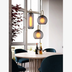 Glass Globe or Capsule Pendant Light with Brass Arch - view 3