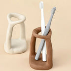 Sculptural Ceramic Loop Toothbrush and Pen Holder – image 4