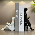 Seated Reading Figure Ornament – product image 1