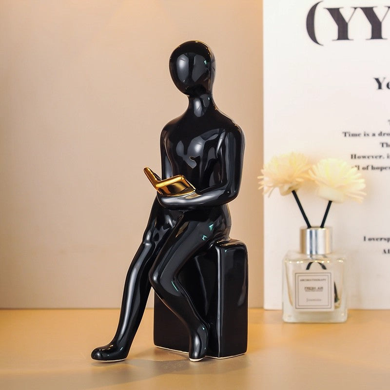 Seated Reading Figure Ornament – product image 4