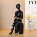 Seated Reading Figure Ornament – product image 4