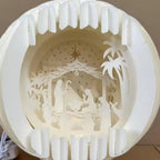 Illuminated Paper-Cut Nativity Scene
